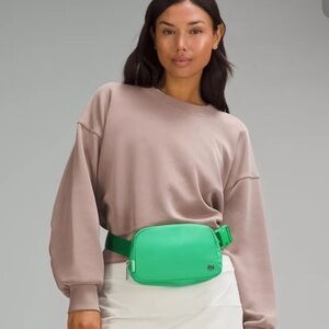 GREEN PUNCH BELT BAG